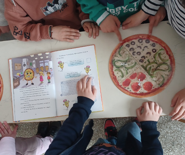 Pupils exploring fractions through storytelling and play